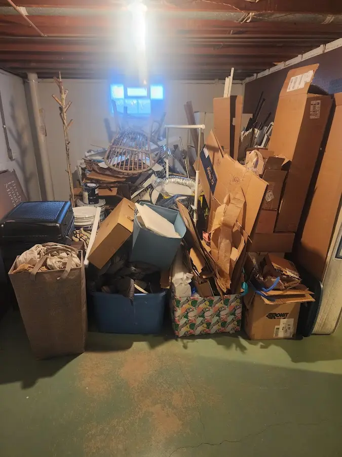 Roll-off dumpster container at job site for Construction Dumpster Rental in Forsyth